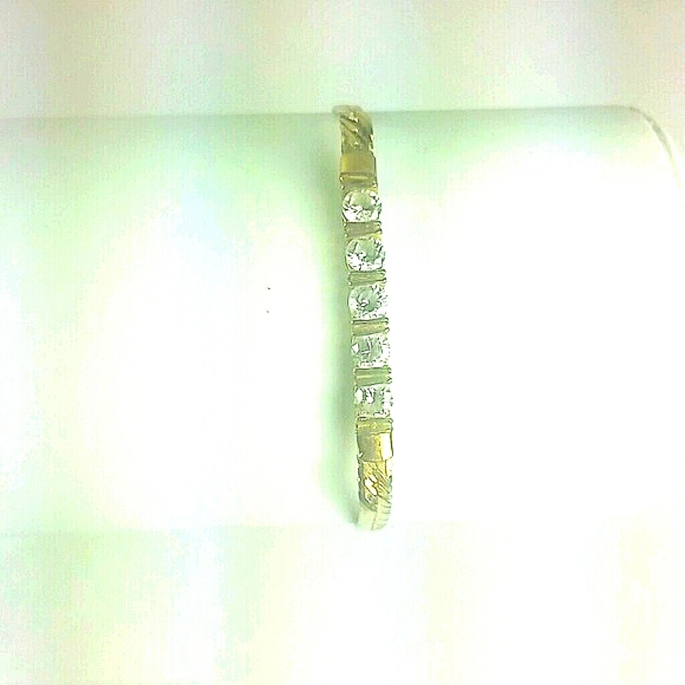 Gold-plated tennis bracelet with 5 clear CZ fold over clasp